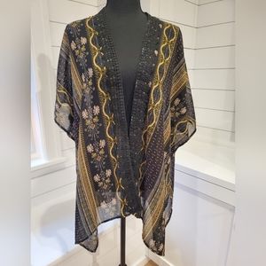 Ladies flowy vest with sleeves